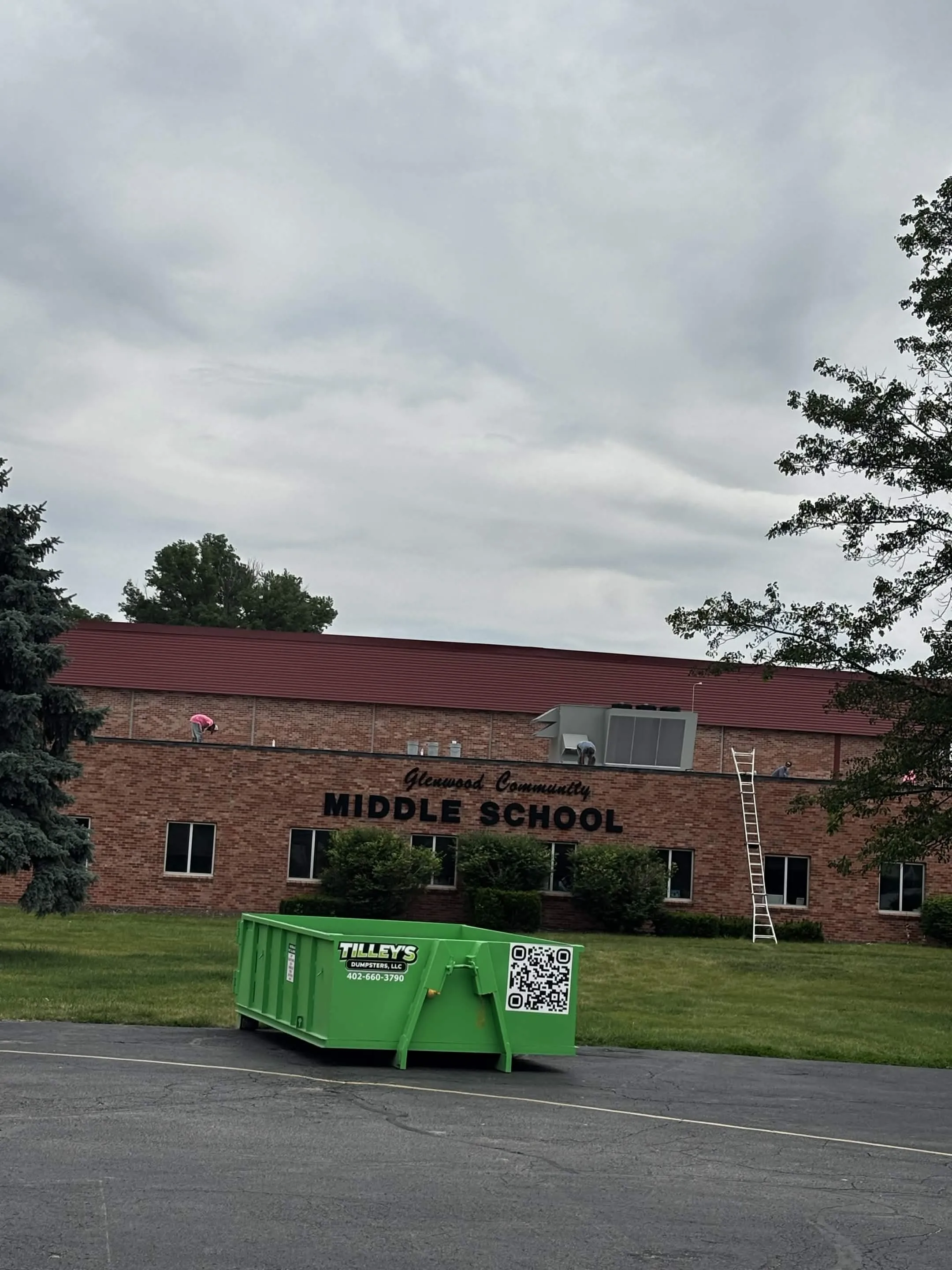 Tilley's dumpster in front of Glenwood Community Middle School