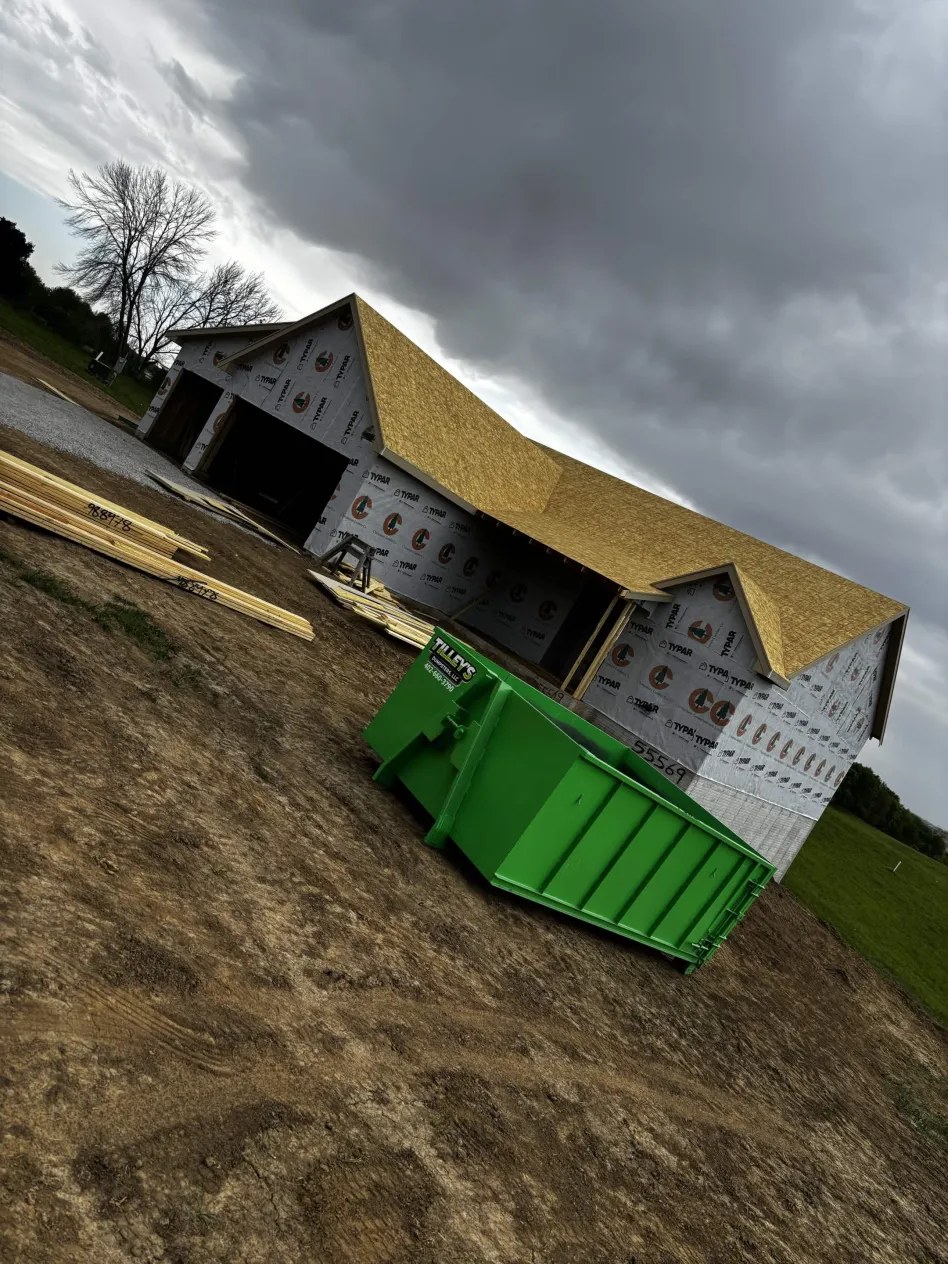 15 yard Tilley's Dumpster at a construction site