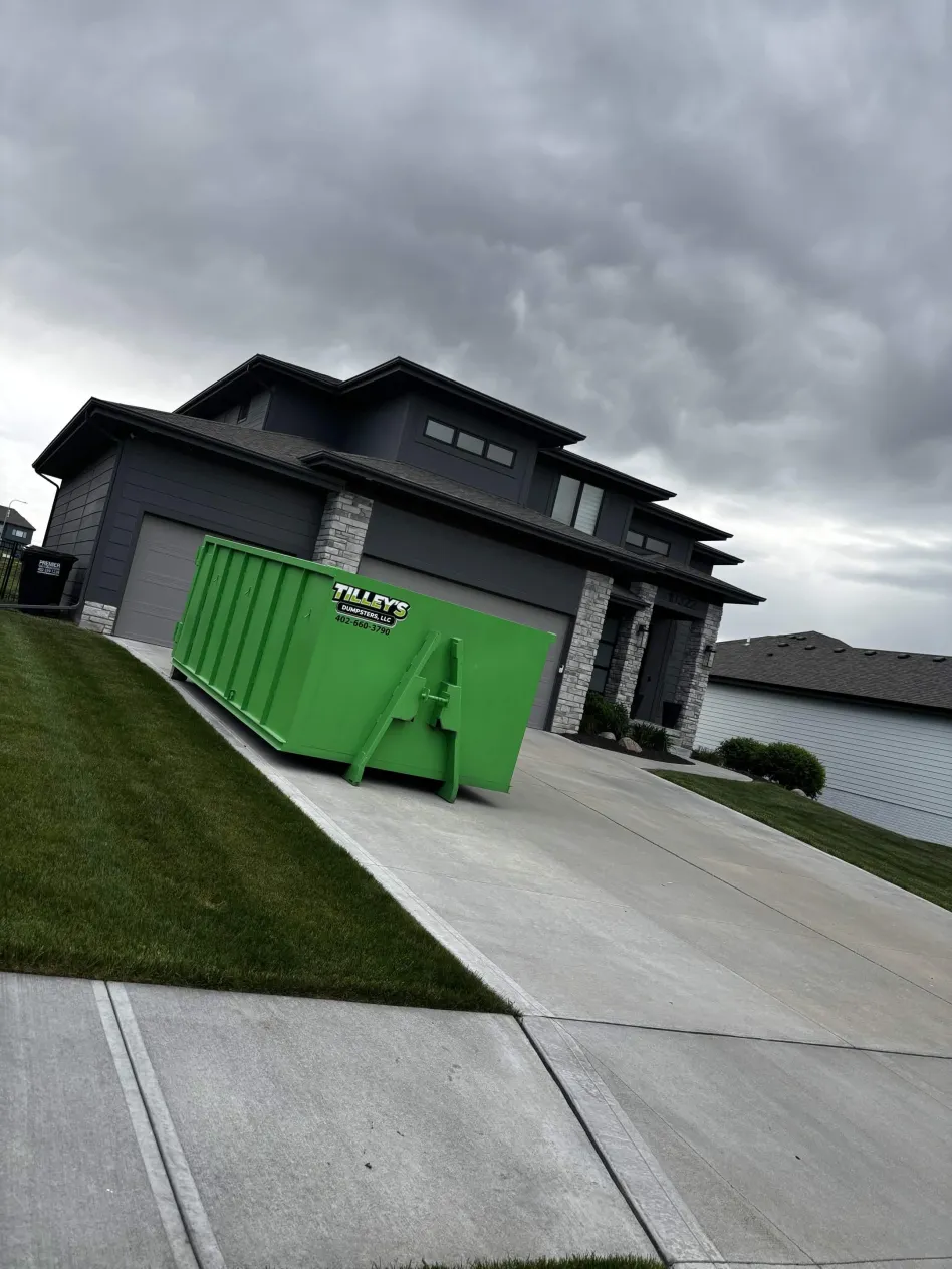 20 yard Tilley's dumpster placed in a residential driveway